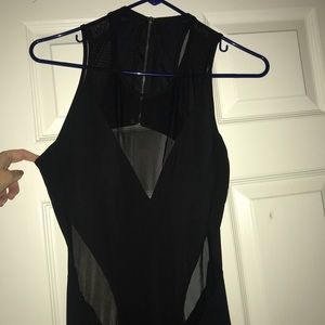 Long black sleeveless gown with mesh sides